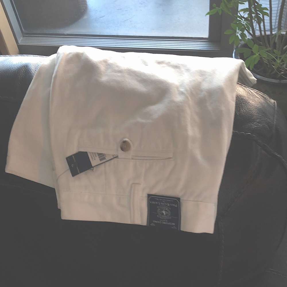 Brand new straight white chinos. Pants length 34 in waist 38